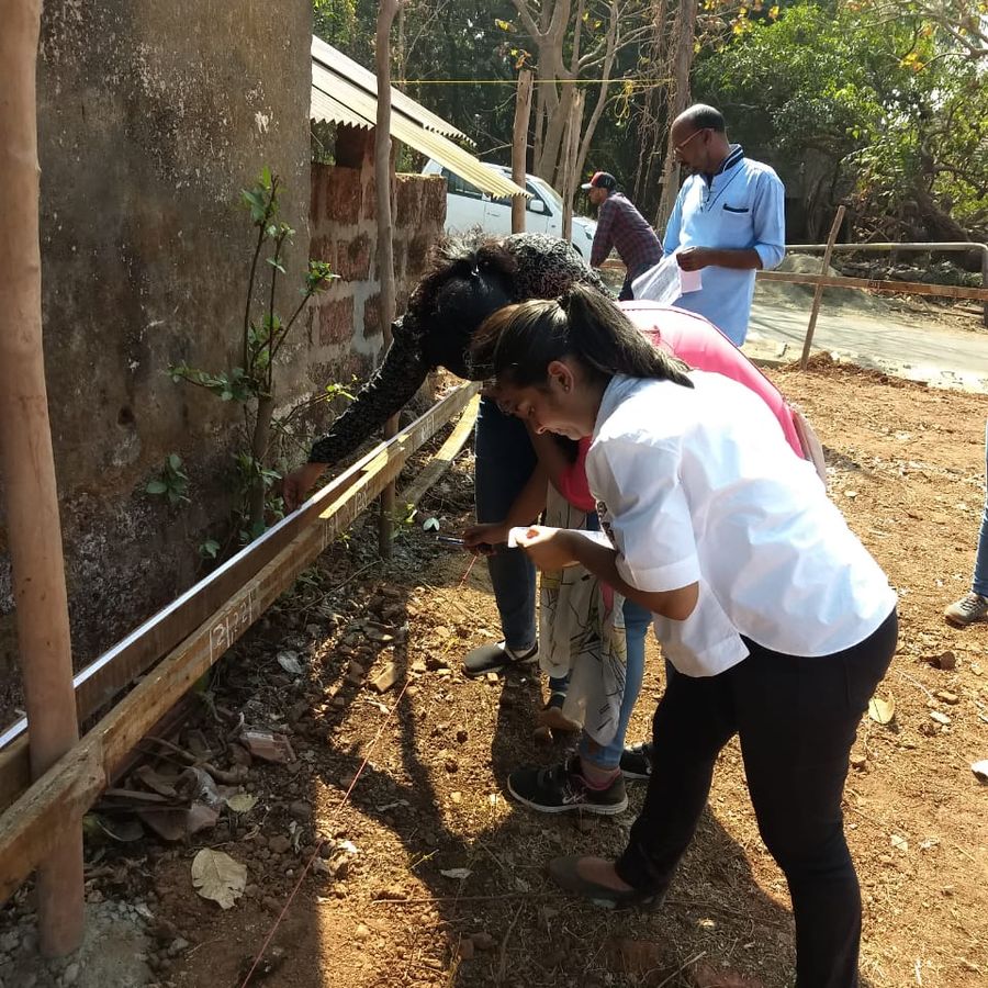 Students at a live construction project during a site visit